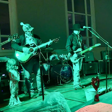 Feathered indians cover with the yarbrough band in new mexico by Bill